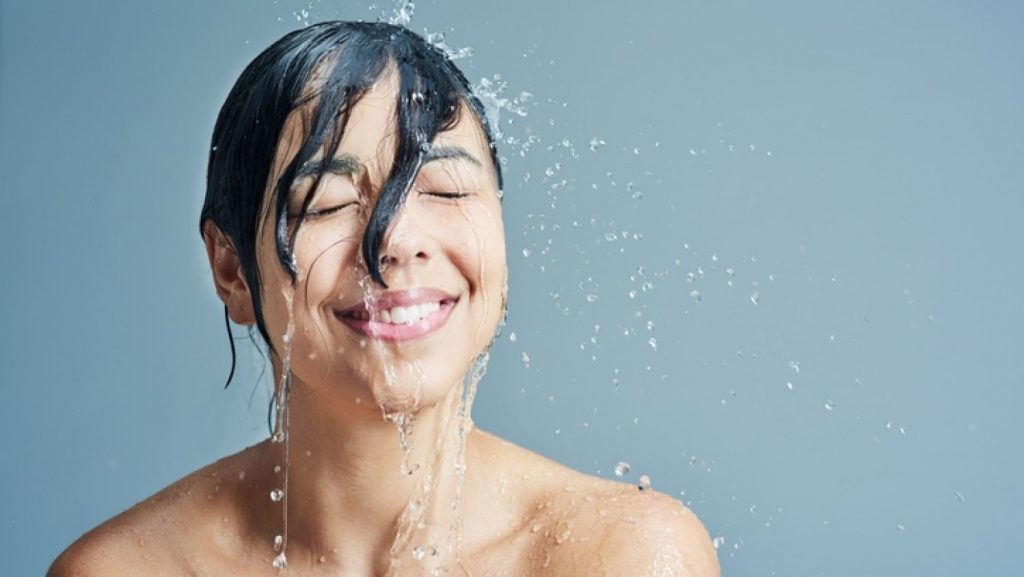 Should You Shower In The Morning Or Night? Here's What A Dermatologist